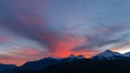 Time lapse of clouds over Tantalus Range in BC Canada at colorful sunset UHD