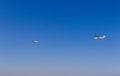 Ultra light, cessna plane drag on glider with prolonge rope on blue sky. Sport, aviation background Royalty Free Stock Photo
