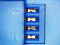 Ultra Macro from the battery for an action camera in blue plastic with markings for the poles Royalty Free Stock Photo