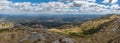 Ultra panoramic view Serra da estrela mountains by Caramulo Mountains, and wind turbines on top of mountains