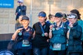 Ultra-Trail Australia UTA11 race. Group of women celebrate their sucess at the race finish
