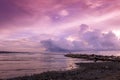 Ultra violet sunrise on the sea shore in Larnaca Royalty Free Stock Photo