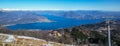 Ultra wide aerial view of the Lake Maggiore and the Alps from Mottarone