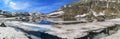 Ultra wide panorama of the lake in the Gotthardpass Royalty Free Stock Photo