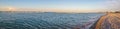 Ultra wide view of the beach of Fano at sunset