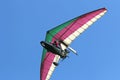 Ultralight airplane flying in a blue sky Royalty Free Stock Photo