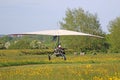 Ultralight airplane on a grass airfield Royalty Free Stock Photo
