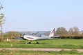 Ultralight airplane on a grass strip Royalty Free Stock Photo