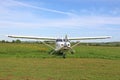 Ultralight airplane on a grass strip Royalty Free Stock Photo
