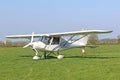 Ultralight airplane on a grass strip Royalty Free Stock Photo