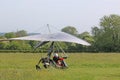 Ultralight airplane taxiing on a farm strip Royalty Free Stock Photo