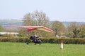 Ultralight airplane taxiing on a farm strip Royalty Free Stock Photo