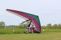 Ultralight airplane taxiing on a farm strip Royalty Free Stock Photo