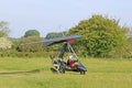 Ultralight airplane taxiing on a farm strip Royalty Free Stock Photo