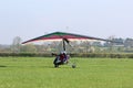 Ultralight airplane taxiing on a farm strip Royalty Free Stock Photo