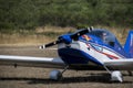 Ultralight plane flying in an airfield Royalty Free Stock Photo