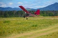 Ultralight plane flying low