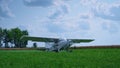 Ultralight private airplane preparing to taking off on green airfield summer day Royalty Free Stock Photo