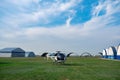 Ultralight white helicopter on green flying field in aeroclub Royalty Free Stock Photo