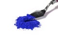 ultramarine pigment, dry paint on a white background, macro Royalty Free Stock Photo