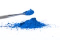 ultramarine pigment, dry paint on a white background, macro Royalty Free Stock Photo