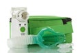 Ultrasonic electronic mesh nebulizer and pediatric mask, spare vial of medication isolated on white