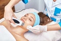 Ultrasonic face cleaning, peeling, in a beauty salon