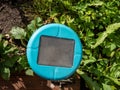 Ultrasonic, solar-powered mole repellent or repeller in the soil in a vegetable bed. Device with beeping keep out pests Royalty Free Stock Photo