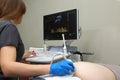 Ultrasound examination of the fetus of a pregnant woman. Apparatus for ultrasound examination. Ultrasonic scanner.