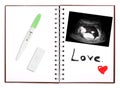 ultrasound film with pregnancy test on notebook included clipping path