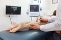 Ultrasound of girl`s knee-joint