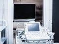 Ultrasound machine with buttons, sensors and monitors. Modern medical equipment in white colors