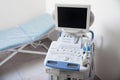 Ultrasound machine and examination table in hospital, above view Royalty Free Stock Photo