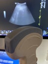 Ultrasound probe closeup with blurred display in background Royalty Free Stock Photo