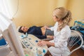 Ultrasound test. Pregnancy. Gynecologist checking fetal life with scanner. Exam. Royalty Free Stock Photo