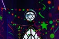 Ultraviolet decoration for celebration Purim Jewish holiday. Colored Purim festival decoration with David star in center Royalty Free Stock Photo