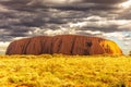 Uluru with dramatic storm clouds in Australia. Royalty Free Stock Photo