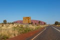 Road sign with directions, image taken from the access road, Yulara, Ayers Rock, Red Center, Australia