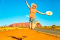 Uluru woman jumping Royalty Free Stock Photo