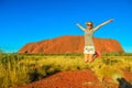 Uluru woman jumping Royalty Free Stock Photo