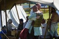 Ulyanovsk, Russia - July 16, 2022: Two men in traditional clothes embrace. Historical reconstruction. Middle Ages