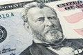 Ulysses S. Grant face on US fifty or 50 dollars bill macro, united states money closeup. Heap of 50 hundred dollar bills on money Royalty Free Stock Photo