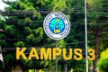 UM campus logo (state university of Malang) with tree background Royalty Free Stock Photo