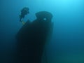 Um el faroud oil tank ship wreck at 40 meters deep with a diver.