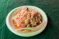 Umai, speciality of Sarawak, Malaysia. Sliced raw fish with a mixture of onions, chillies, vinegar, salt and lime jui