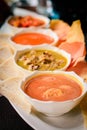 umami-filled platter of Thai Red Curry Beef, Thai Green Curry Chicken, Indonesian Squid Curry and Malaysian Prawn Curry. Served w