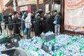 Uman,Ukraine, 13.09.2015: Jewish men enter the gates near which there are a lot of package with drink water