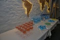 Event refreshment table with drinks and snacks Royalty Free Stock Photo