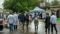 Uman, Ukraine - 10 September 2018: Rosh Hashanah,. A sad chasid child walks down the street in a crowd of adults.