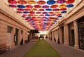 Umbrella artwork display on a street in the city of Bath, Somerset, UK.